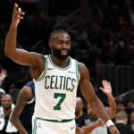 Boston Celtics guard Jaylen Brown (7) reacts to his three point basket against the Minnesota Timberwolves during the second half at TD Garden.
