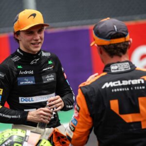 Oscar Piastri of the McLaren F1 Team MCL38 and Lando Norris of the McLaren F1 Team MCL38 pose for a portrait