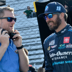 NASCAR Cup Series driver Martin Truex Jr. (19) talks with Dale Earnhardt Jr. on Saturday, July 30, 2022, during practice for the Verizon 200 at the Brickyard at Indianapolis Motor Speedway.