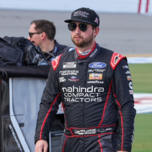 NASCAR Cup Series driver Chase Briscoe (14) walks to his car before qualifying for the Coke 400 at Daytona International Speedway