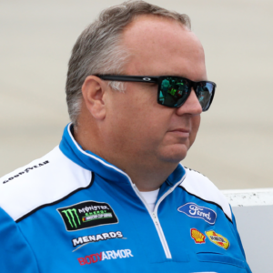 NASCAR Cup Series driver Ryan Blaney (right) stands with his crew chief Jeremy Bullins (left) on pit road prior to the Drydene 400 at Dover International Speedway.