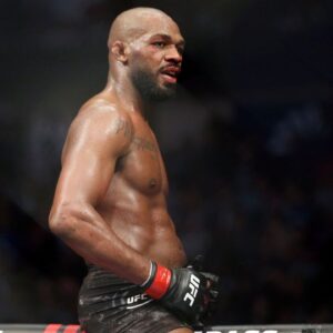 Jon Jones (red gloves) reacts after his fight Dominick Reyes (not pictured) during UFC 247 at Toyota Center.
