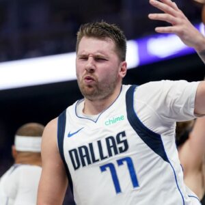 Dallas Mavericks guard Luka Doncic (77) reacts after making a layup against the Golden State Warriors in the second quarter at the Chase Center.