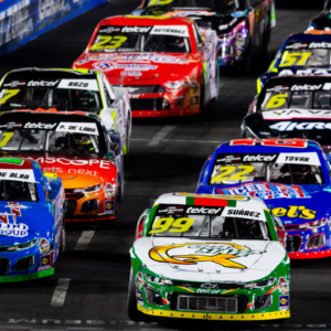 NASCAR Mexico Series drivers Daniel Suarez (99) and Alex de Alba (14) lead the field to the green flag during a NASCAR Mexico Series race at the Los Angeles Memorial Coliseum.