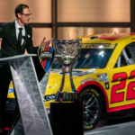 NASCAR Cup Series champion Joey Logano speaks during the NASCAR Awards Show at Music City Center in Nashville, Tenn.