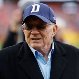 Dallas Cowboys owner Jerry Jones walks off the field after warmups prior to the game against the Washington Commanders at FedExField.