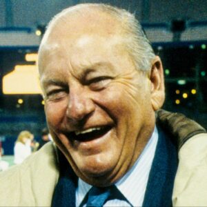 St. Louis Cardinals owner Bill Bidwill (left) talks with Dallas Cowboys general manager Tex Schramm (right) on the field at Busch Stadium