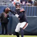 Nov 10, 2024; Chicago, Illinois, USA; Chicago Bears quarterback Caleb Williams (18) looks to pass against the New England Patriots during the second half at Soldier Field.