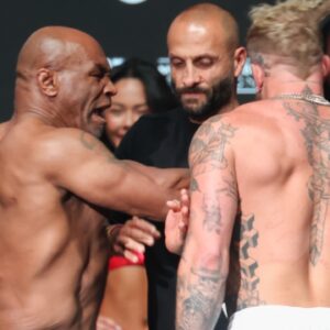 Mike Tyson slaps Jake Paul after weighing in at the Toyota Music Factory.