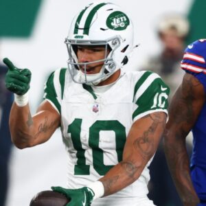 Oct 14, 2024; East Rutherford, New Jersey, USA; New York Jets wide receiver Allen Lazard (10) celebrates after making a first down catch during the first half of their game against the Buffalo Bills at MetLife Stadium.