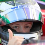 Abbie Eaton gives a thumbs up prior to the W Series race qualification on May 7, 2022 at the Miami International Autodrome in Miami Gardens, Florida
