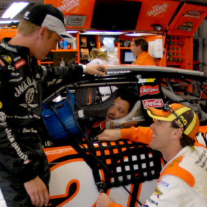 Nascar Nextel Cup Series drivers Tony Stewart (20), Clint Bowyer (07), and Kevin Harvick (29) talk prior to the start of practice for the Allstate 400 at the Brickyard, at Indianapolis Motor Speedway.