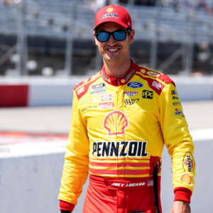 NASCAR Cup Series driver Joey Logano (22) walks down pit road prior to practice for the Cook Out Southern 500 at Darlington Raceway.