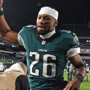 Philadelphia Eagles running back Saquon Barkley (26) runs off the field after win against the Washington Commanders at Lincoln Financial Field.
