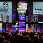 Francis Flock, widow of NASCAR Sprint Cup Series driver Tim Flock, makes a speech on behalf of her husband after he was inducted to the Hall of Fame during the NASCAR hall of fame induction ceremony at NASCAR Hall of Fame.