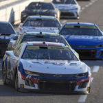 NASCAR Cup Series driver William Byron (24) leads a group into turn three during the Xfinity 500 at Martinsville Speedway.