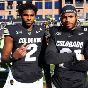 Colorado Buffaloes quarterback Shedeur Sanders (2) and safety Shilo Sanders (21) before the game against the Oklahoma State Cowboys