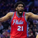 Philadelphia 76ers center Joel Embiid (21) reacts to a play against the New York Knicks during the third quarter at Wells Fargo Center