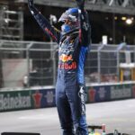 LAS VEGAS, NV - NOVEMBER 23: Max Verstappen (1) Oracle Red Bull Racing lifts his arms in the air after winning his fourth F1 world title at the Heineken Silver Las Vegas Grand Prix on Saturday, Nov. 23, 2024