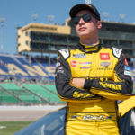 NASCAR Cup Series driver Christopher Bell (20) stands by his car before NASCAR Cup Qualifying at Kansas Speedway.