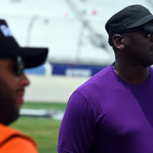 NASCAR Cup Series 23XI Racing owner Michael Jordan and driver Bubba Wallace (23) on pit road during qualifying for the Ally 400 at Nashville Superspeedway.