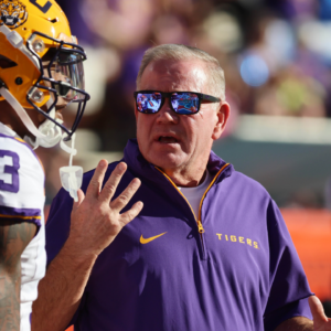LSU Tigers head coach Brian Kelly gestures prior to the game against the Florida Gators at Ben Hill Griffin Stadium.