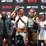 Jake Paul (right) faces off with Mike Tyson (left) during a press conference at The Pavilion at Toyota Music Factory.