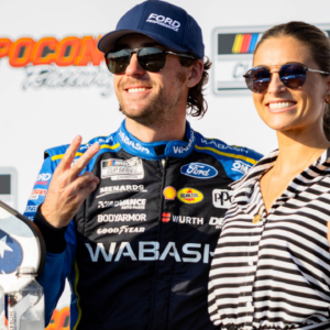 Team Penske's Ryan Blaney (12) poses with his fiancé Gianna Tulio