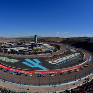 NASCAR Cup Series driver Martin Truex Jr. (19) and driver Joey Logano (22) lead the field for the start during the Cup Series championship race at Phoenix Raceway.