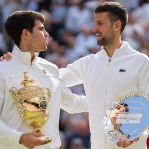 Carlos Alcaraz (L) and Novak Djokovic (R) after Wimbledon 2024 final