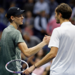 Jannik Sinner (ITA) (L) shakes hands with Daniil Medvedev (R)
