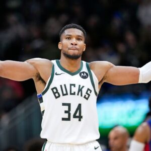 Milwaukee Bucks forward Giannis Antetokounmpo (34) celebrates following the game against the Detroit Pistons at Fiserv Forum.