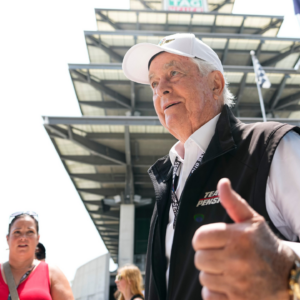 Roger Penske greets fans Saturday, July 20, 2024, during qualifying for the Brickyard 400 at Indianapolis Motor Speedway.