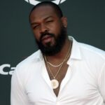 Jon Jones arrives on the red carpet before the 2023 ESPYS at the Dolby Theatre.