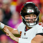 Tampa Bay Buccaneers quarterback Baker Mayfield (6) throws a pass during the first half against the Kansas City Chiefs at GEHA Field at Arrowhead Stadium.