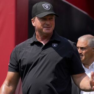Las Vegas Raiders head coach Jon Gruden walks onto the field before the start of the game against the San Francisco 49ers at Levi's Stadium.