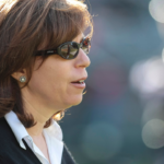 Aug 11, 2011; Oakland, CA, USA; Oakland Raiders chief executive officer Amy Trask watches practice before the game against the Arizona Cardinals at the O.co Coliseum. Mandatory Credit: Kelley L Cox-Imagn Images