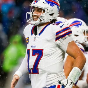 Buffalo Bills quarterback Josh Allen (17) celebrates after throwing a touchdown pass against the Seattle Seahawks during the second quarter at Lumen Field.