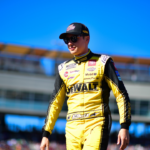 NASCAR Cup Series driver Christopher Bell (20) is introduced before the Cup Series championship race at Phoenix Raceway.