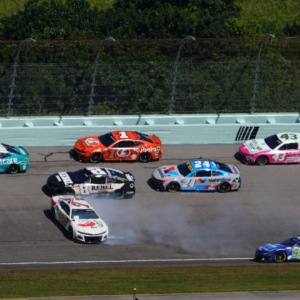 NASCAR Cup Series driver Corey LaJoie (7) spins in front of NASCAR Cup Series driver Kyle Busch (8) and NASCAR Cup Series driver Daniel Suarez (99) during the Straight Talk Wireless 400 at Homestead-Miami Speedway.