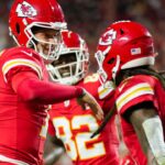 Nov 4, 2024; Kansas City, Missouri, USA; Kansas City Chiefs quarterback Patrick Mahomes (15) celebrates with wide receiver DeAndre Hopkins (8) after scoring a touchdown during the first half against the Tampa Bay Buccaneers at GEHA Field at Arrowhead Stadium.