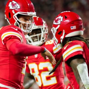 Nov 4, 2024; Kansas City, Missouri, USA; Kansas City Chiefs quarterback Patrick Mahomes (15) celebrates with wide receiver DeAndre Hopkins (8) after scoring a touchdown during the first half against the Tampa Bay Buccaneers at GEHA Field at Arrowhead Stadium.