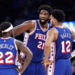 Philadelphia 76ers center Joel Embiid (21) talks to guard Patrick Beverley (22) and forward Tobias Harris (12) during a time out against the Oklahoma City Thunder during the second half at Paycom Center.