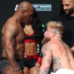 Jake Paul and Mike Tyson face off during weigh-ins at the Toyota Music Factory the day before their fight.