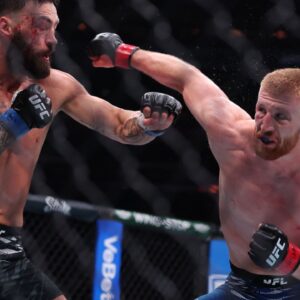 New York, NY, USA; Bo Nickal (red gloves) fights Paul Craig in the middleweight bout during UFC 309 at Madison Square Garden.