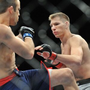 Colin Hart defends against Luke Barnatt during the TUF 17 Finale at the Mandalay Bay Events Center.