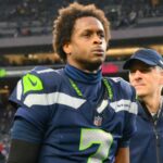 Dec 22, 2024; Seattle, Washington, USA; Seattle Seahawks quarterback Geno Smith (7) walks off the field after the game against the Minnesota Vikings at Lumen Field.