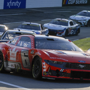 NASCAR Cup Series driver Brad Keselowski (6) leads the field out of turn two during the Xfinity 500 at Martinsville Speedway.