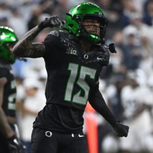 Dec 7, 2024; Indianapolis, IN, USA; Oregon Ducks wide receiver Tez Johnson (15) reacts after a run for a gain during the second quarter against the Penn State Nittany Lions in the 2024 Big Ten Championship game at Lucas Oil Stadium.