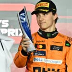 FORMULA ONE QATAR GRAND PRIX 2024 Third place Australian Formula One driver Oscar Piastri of McLaren celebrates with trophy on the podium after the Formula 1 Grand Prix of Qatar at Lusail International Circuit in Lusail, Qatar